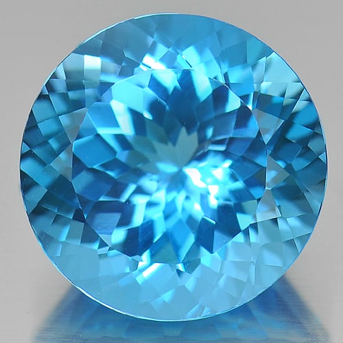 Natural Swiss Blue Topaz 14.50 Ct. Round Shape 15 Mm Gemstone From Brazil: Product ID: 807166410 Product Name: Natural Blue Topaz Weight: 14.50 CT. Size: 15 x 15 x 9.8 MM. Shape: Round Color: Blue Clarity:IF Luster: Good Gems Origin: Brazil Treatment: Treated Crystal Structu