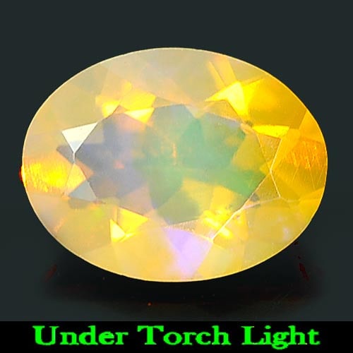 Natural Multi Color Play Of Colour Opal 1.03 Ct. Oval Shape 9.1 x 7 Mm Gemstone From Ethiopia: Product ID: 818725054 Product Name: Natural Opal Weight: 1.03 CT. Size: 9.1 x 7 x 4.4 MM. Shape: Oval Color: Multi Color Clarity:Semi - Transparent Luster: Iridescent Gems Origin: Ethiopia Treatment: 