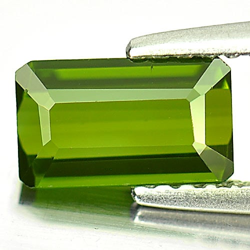 Natural Green Tourmaline 0.96 Ct. Octagon Shape 7.7 x 4.6 Mm Gemstone From Nigeria: Product ID: 807245295 Product Name: Natural Tourmaline Weight: 0.96 CT. Size: 7.7 x 4.6 x 2.7 MM. Shape: Octagon Color: Green Clarity:VSI Luster: Good Gems Origin: Nigeria Treatment: Unheated Crystal 