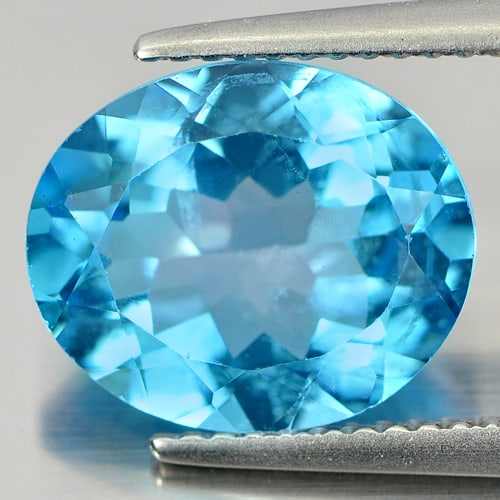 Natural Swiss Blue Topaz 5.01 Ct. Oval Shape 12 x 10 Mm Gemstone From Brazil: Product ID: 807161227 Product Name: Natural Blue Topaz Weight: 5.01 CT. Size: 12 x 10 x 5.6 MM. Shape: Oval Color: Blue Clarity:VSI Luster: Good Gems Origin: Brazil Treatment: Treated Crystal Structur