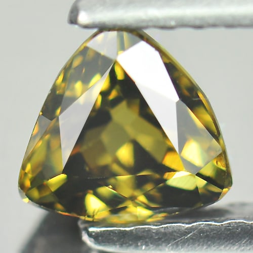 Natural Greenish Yellow Demantoid Garnet 1.07 Ct. Trilliant Shape 5.7 x 5.6 Mm. Unheated Gemstone: Product ID: 802931389 Product Name: Natural Demantoid Weight: 1.07 CT. Size: 5.7 x 5.6 x 4.4 MM. Shape: Trilliant Color: Yellow Clarity:VSI Luster: Very Good Gems Origin: Madagascar Treatment: Unheate
