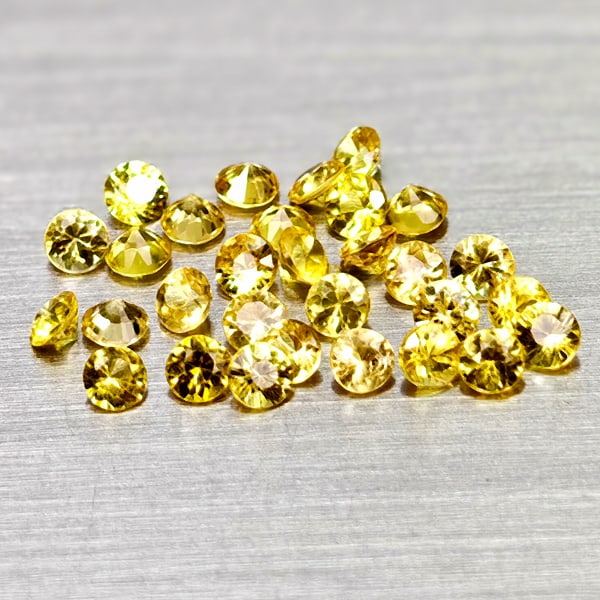 Natural Yellow Songea Sapphire 1.47 Ct. 30 Pcs Round Diamond Cut 2.1 Mm Gemstones From Tanzania: Product ID: 806162385 Product Name: Natural Yellow Sapphire Weight: 1.47 CT. Size: 2.1 x 2.1 x 1.4 MM. Shape: Round Diamond Cut Color: Yellow Clarity:VSI - SI1 Luster: Good Gems Origin: Tanzania Treat