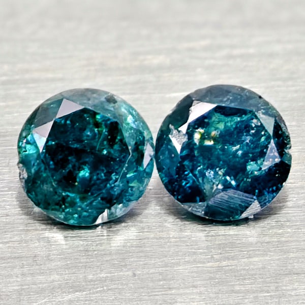 Natural Blue Loose Diamond 0.18 Ct. 2 Pcs Round Diamond Cut 2.9 Mm From Belgium: Product ID: 502100344 Product Name: Natural Natural Diamond Weight: 0.18 CT. Size: 2.9 x 2.9 x 1.7 MM. Shape: Round Diamond Cut Color: Blue Clarity:SI1 Luster: Good Gems Origin: Belgium Treatment: Tre
