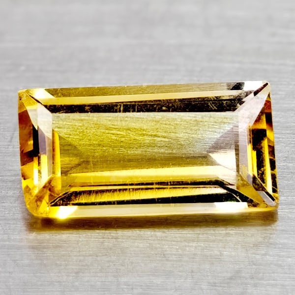 Natural Yellow Citrine 1.41 Ct. Clean Baguette Shape 10 x 5.1 Mm Gemstone From Brazil: Product ID: 801815030 Product Name: Natural Citrine Weight: 1.41 CT. Size: 10 x 5.1 x 3.5 MM. Shape: Baguette Color: Yellow Clarity:If Luster: Good Gems Origin: Brazil Treatment: Unheated Crystal Stru