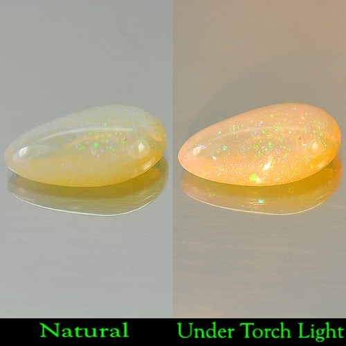 Natural Multi-Color Opal 2.92 Ct. Pear Cabochon Shape 14 x 8.6 Mm. Gemstone: Product ID: 818707748 Product Name: Natural Opal Weight: 2.92 CT. Size: 14 x 8.6 x 5 MM. Shape: Pear Cabochon Color: Multi Color Clarity:Semi - Transparent Luster: Good Gems Origin: Ethiopia Treatment