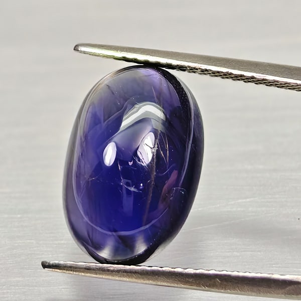 Natural Blue Diffusion Sapphire 7.93 Ct. Oval Cabochon Shape 15.2 x 10.2 Mm Gemstone (1 of 3)
