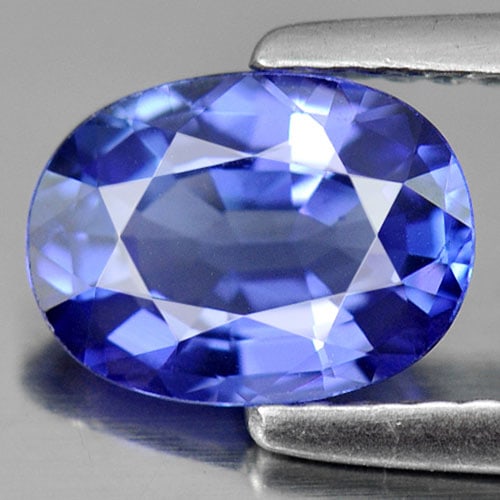Natural Violetish Blue Tanzanite 1.24 Ct. Clean Oval Shape 8.2 x 6 Mm. Gemstone From Tanzania: Product ID: 807006268 Product Name: Natural Tanzanite Weight: 1.24 CT. Size: 8.2 x 6 x 3.4 MM. Shape: Oval Color: Violetish Blue Clarity:IF Luster: Very Good Gems Origin: Tanzania Treatment: Heated Cr