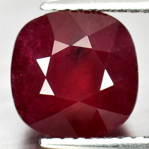 Natural Purplish Red Ruby 4.62 Ct. Cushion Shape 8.5 x 8.5 x 6.4 Mm. Gemstone: Product ID: 805931157 Product Name: Natural Ruby Weight: 4.62 CT. Size: 8.5 x 8.5 x 6.4 MM. Shape: Cushion Color: Purplish Red Clarity:SI1 Luster: Good Gems Origin: Mardagascar Treatment: Heated (Lead