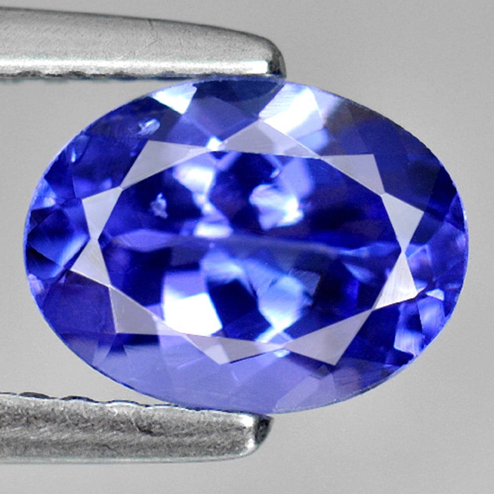 Natural Violetish Blue Tanzanite 1.44 Ct. Oval Shape 8.2 x 6.2 Mm. Gemstone From Tanzania: Product ID: 807009028 Product Name: Natural Tanzanite Weight: 1.44 CT. Size: 8.2 x 6.2 x 4.1 MM. Shape: Oval Color: Violetish Blue Clarity:VSI Luster: Very Good Gems Origin: Tanzania Treatment: Heated
