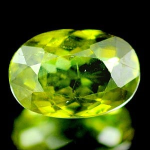 Natural Green Demantoid Garnet 0.60 Ct. Oval Shape 6.2 x 4.2 Mm Gemstone From Madagascar: Product ID: 802925176 Product Name: Natural Demantoid Weight: 0.60 CT. Size: 6.2 x 4.2 x 2.5 MM. Shape: Oval Color: Green Clarity:SI Luster: Good Gems Origin: Mardagascar Treatment: Unheated Crystal S