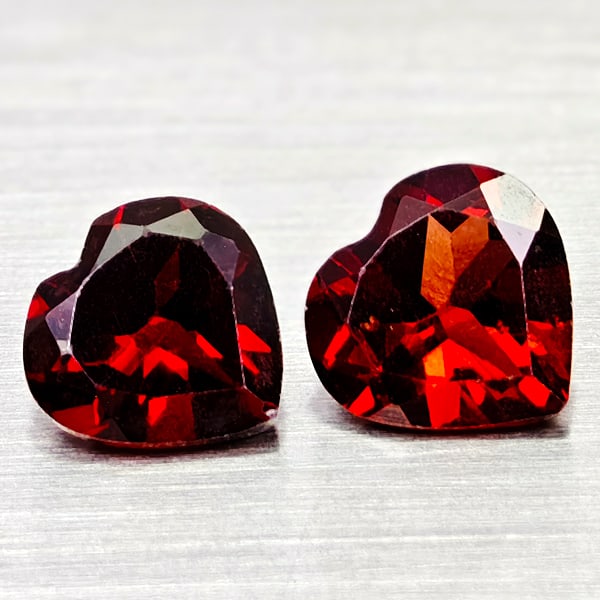 Natural Orangish Red Garnet 2.36 Ct. 2 Pcs Heart Shape 6.9 x 6.7 MM Gemstones From Tanzania: Product ID: 802936634 Product Name: Natural Red Garnet Weight: 2.36 CT. Size: 6.9 x 6.8 x 3.7 MM. Shape: Heart Shape Color: Orangish Red Clarity:VSI Luster: Good Gems Origin: Tanzania Treatment: Unhea