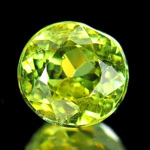 Natural Green Demantoid Garnet 0.98 Ct. Oval Shape 5.6 x 5.3 Mm Gemstone From Madagascar: Product ID: 802924264 Product Name: Natural Demantoid Weight: 0.98 CT. Size: 5.6 x 5.3 x 3.5 MM. Shape: Oval Color: Green Clarity:SI Luster: Good Gems Origin: Mardagascar Treatment: Unheated Crystal S