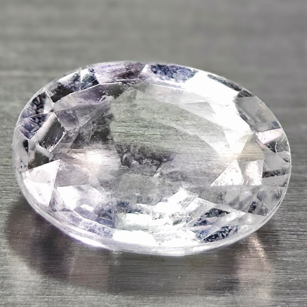 Natural White Topaz 0.95 Ct. Oval Shape 7.1 x 5.2 Mm Gemstone From Brazil: Product ID: 107117166 Product Name: Natural Topaz Weight: 0.95 CT. Size: 7.1 X 5.2 X 3 MM. Shape: Oval Color: White Clarity:IF Luster: Good Gems Origin: Brazil Treatment: Unheated Crystal Structure: O