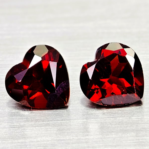 Natural Orangish Red Garnet 3.02 Ct. 2 Pcs Heart Shape 7.1 x 7.1 MM Gemstones From Tanzania: Product ID: 802936628 Product Name: Natural Red Garnet Weight: 3.02 CT. Size: 7.1 x 7.1 x 4 MM. Shape: Heart Shape Color: Orangish Red Clarity:VSI Luster: Good Gems Origin: Tanzania Treatment: Unheate