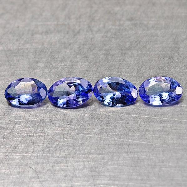 Natural Violet Blue Tanzanite 1.44 Ct. 4 Pcs Oval Shape 6.2 x 4.2 Mm Gemstones From Tanzania: Product ID: 807015003 Product Name: Natural Tanzanite Weight: 1.44 CT. Size: 6.2 x 4.1 x 2.7 MM. Shape: Oval Color: Violet Blue Clarity:VSI Luster: Good Gems Origin: Tanzania Treatment: Heated Crystal