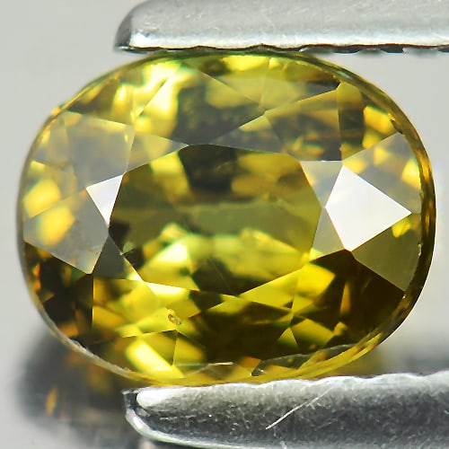 Natural Greenish Yellow Demantoid Garnet 1.14 Ct. Oval Shape 6.5 x 5.3 Mm. Unheated Gemstone: Product ID: 802931360 Product Name: Natural Demantoid Weight: 1.14 CT. Size: 6.5 x 5.3 x 3.7 MM. Shape: Oval Color: Greenish Yellow Clarity:VSI Luster: Good Gems Origin: Madagascar Treatment: Unheated