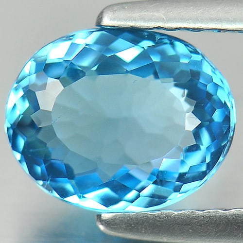 Natural Swiss Blue Topaz 1.75 Ct. Oval Shape 8.1 x 6.5 Mm Gemstone From Brazil: Product ID: 807155341 Product Name: Natural Blue Topaz Weight: 1.75 CT. Size: 8.1 x 6.5 x 4 MM. Shape: Oval Color: Swiss Blue Clarity:VSI Luster: Good Gems Origin: Brazil Treatment: Treated Crystal St