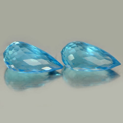 Natural Blue Topaz 2.35 Ct. 2 Pcs. Briolette Cut 8.5 x 4.2 Mm Gemstone From Brazil: Product ID: 807151223 Product Name: Natural Blue Topaz Weight: 2.35 CT. Size: 8.5 x 4.2 x 4.2 MM. Shape: Briolette Color: Blue Clarity:VVS Luster: Good Gems Origin: Brazil Treatment: Treated Crystal S