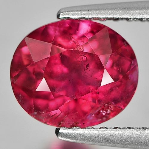 Natural Reddish Pink Tourmaline 1.90 Ct. Oval Shape 8 x 6.8 Mm. Gemstone From Nigeria: Product ID: 807244080 Product Name: Natural Tourmaline Weight: 1.90 CT. Size: 8 x 6.8 x 5.5 MM. Shape: Oval Color: Reddish Pink Clarity:SI1 Luster: Good Gems Origin: Nigeria Treatment: Unheated Crysta