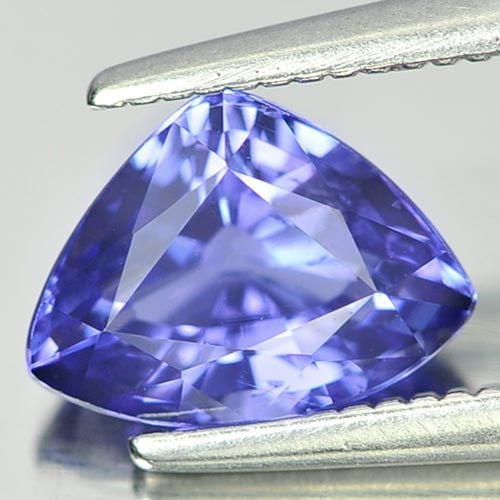Natural Violetish Blue Tanzanite 1.23 Ct. Trilliant Shape 8.1 x 6 Mm Gemstone From Tanzania: Product ID: 807006125 Product Name: Natural Tanzanite Weight: 1.23 CT. Size: 8.1 x 6 x 4 MM. Shape: Trilliant Color: Blue Clarity:SI Luster: Good Gems Origin: Tanzania Treatment: Heated Crystal Struct