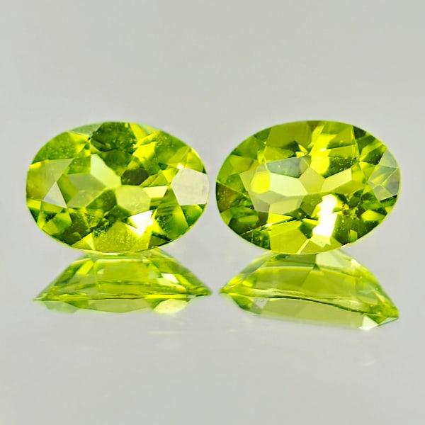 Natural Green Peridot 1.75 Ct. 2 Pcs VVS Oval Shape 7 x 5 Mm. Gemstone From Pakistan: Product ID: 805316951 Product Name: Natural Peridot Weight: 1.45 CT. Size: 7 x 5 x 3.5 MM. Shape: Oval Color: Green Clarity:VVS Luster: Good Gems Origin: Pakistan Treatment: Unheated Crystal Structure