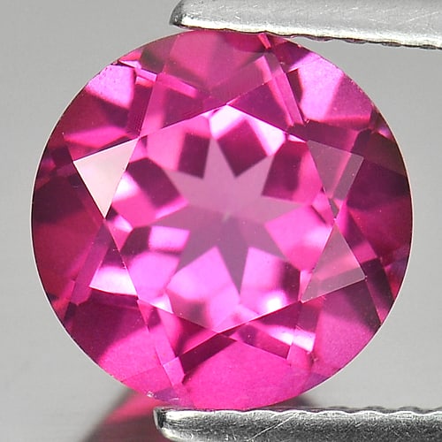 Natural Pink Topaz 3.24 Ct. Clean Round Shape 9 Mm. Gemstone From Brazil: Product ID: 807157617 Product Name: Natural Topaz Weight: 3.24 CT. Size: 9 x 9 x 5.6 MM. Shape: Round Color: Pink Clarity:IF Luster: Good Gems Origin: Brazil Treatment: Treated Crystal Structure: Orth