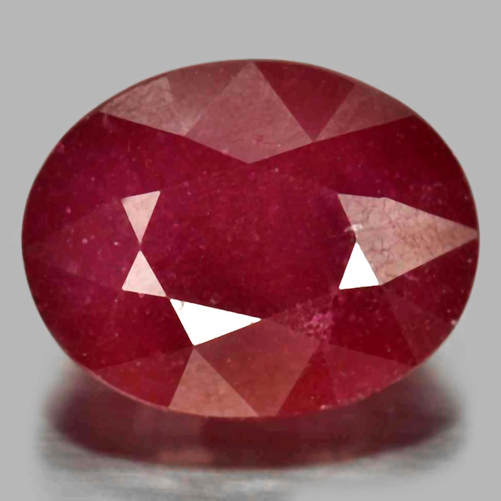 Natural Purplish Red Ruby 7.91 Ct. Oval Shape 12.6 x 10 Mm. Gemstone From Madagascar: Product ID: 805931140 Product Name: Natural Ruby Weight: 7.91 CT. Size: 12.6 x 10 x 6.4 MM. Shape: Oval Color: Red Clarity:SI1 Luster: Good Gems Origin: Madagascar Treatment: Heated Lead-glass filling