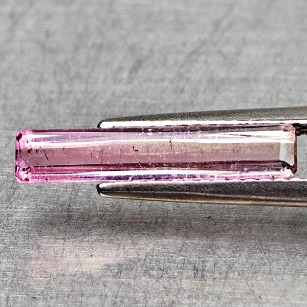 Natural Pink Tourmaline 1.23 Ct. Octagon Shape 16 x 3.1 Mm Gemstone From Nigeria: Product ID: 807250535 Product Name: Natural Tourmaline Weight: 1.23 CT. Size: 16 x 3.1 x 2.5 MM. Shape: Octagon Color: Party Color Pink Clarity:VSI Luster: Good Gems Origin: Nigeria Treatment: Unheate