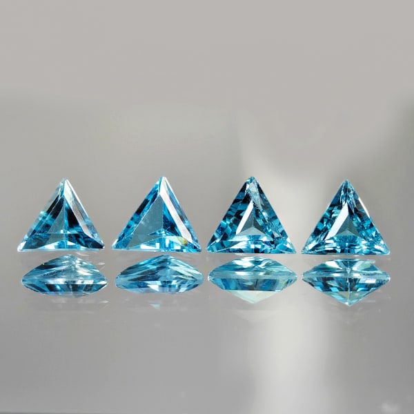 Natural Swiss Blue Topaz 1.99 Ct. 4 Pcs Trilliant Shape 5.6 x 5.6 Mm. Gemstones From Brazil: Product ID: 807167760 Product Name: Natural Blue Topaz Weight: 1.99 CT. Size: 5.6 x 5.6 x 2.7 MM. Shape: Trilliant Color: Blue Clarity:VVS Luster: Good Gems Origin: Brazil Treatment: Treated Crystal S