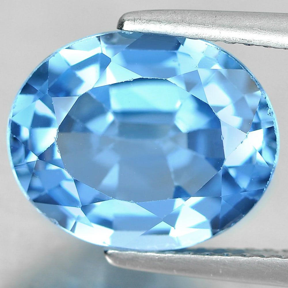 Natural Blue Topaz 5.96 Ct. Oval Shape 12.2 x 10 Mm Gemstone From Brazil: Product ID: 807167308 Product Name: Natural Blue Topaz Weight: 5.96 CT. Size: 12.2 x 10 x 6 MM. Shape: Oval Color: Blue Clarity:SI1 Luster: Good Gems Origin: Brazil Treatment: Treated Crystal Structur