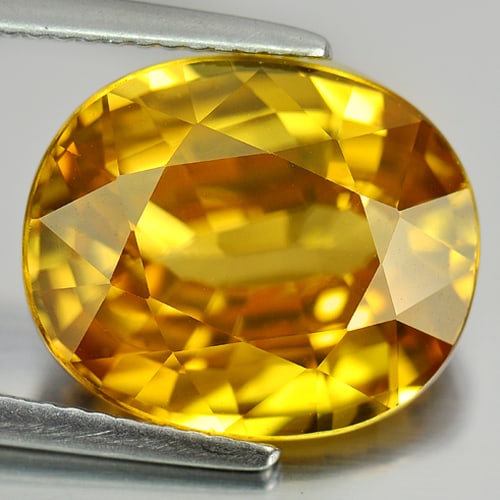 Natural Yellow Zircon 12.96 Ct. Clean Oval Shape 14.5 x 12.2 Mm. Gemstone From Cambodia (1 of 3)