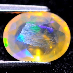 Natural Multi Color Opal 1.65 Ct. Oval Shape 9.6 x 7.5 Mm Gemstone From Ethiopia: Product ID: 818711954 Product Name: Natural Opal Weight: 1.65 CT. Size: 9.6 x 7.5 x 5 MM. Shape: Oval Color: Multi Color Clarity:Semi - Transparent Luster: Good Gems Origin: Ethiopia Treatment: Unheat