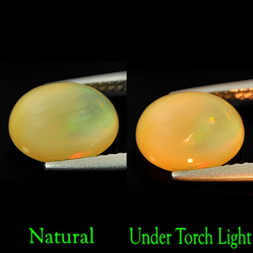 Natural Multi Color Opal 2.12 Ct. Oval Cabochon Shape 9.7 x 7.8 Mm Gemstone From Ethiopia: Product ID: 818711185 Product Name: Natural Opal Weight: 2.12 CT. Size: 9.7 x 7.8 x 5.3 MM. Shape: Oval Cabochon Color: Multi Color Clarity:Semi - Transparent Luster: Good Gems Origin: Ethiopia Treatm