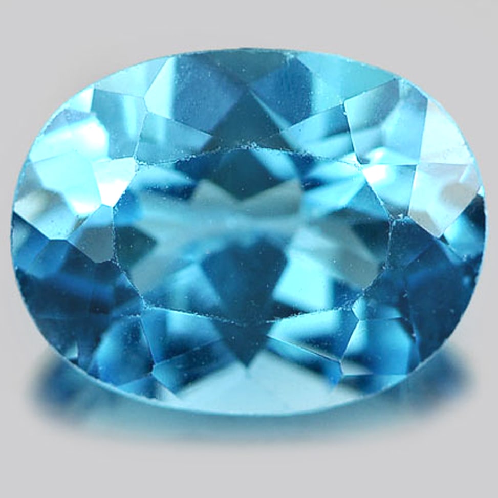 Natural Swiss Blue Topaz 2.28 Ct. Oval Shape 9.1 x 7 Mm. Gemstone From Brazil: Product ID: 807162185 Product Name: Natural Blue Topaz Weight: 2.28 CT. Size: 9.1 x 7 x 4.8 MM. Shape: Oval Color: Blue Clarity:VSI Luster: Good Gems Origin: Brazil Treatment: Treated Crystal Structur