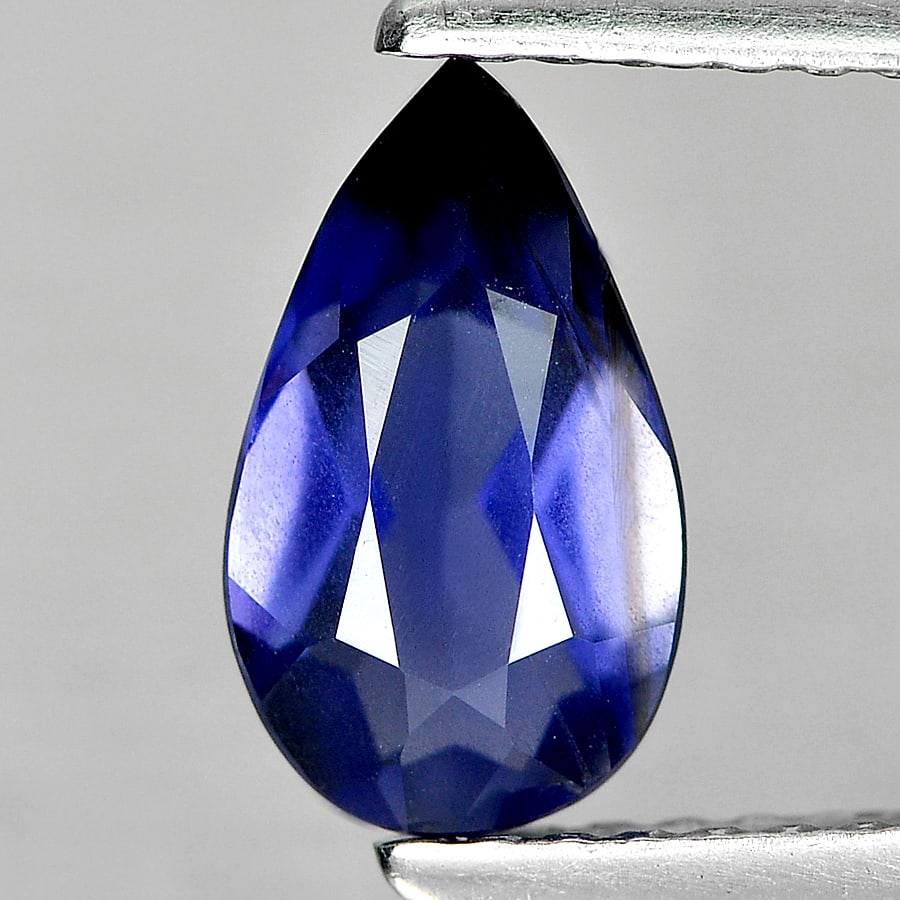 Natural Violet Blue Iolite 0.85 Ct. Pear 9 x 5.4 Mm Gemstone From Madagascar: Product ID: 803804800 Product Name: Natural Iolite Weight: 0.85 CT. Size: 9 x 5.4 x 3.6 MM. Shape: Pear Color: Blue Clarity:VSI Luster: Good Gems Origin: Madagascar Treatment: Unheated Crystal Structu