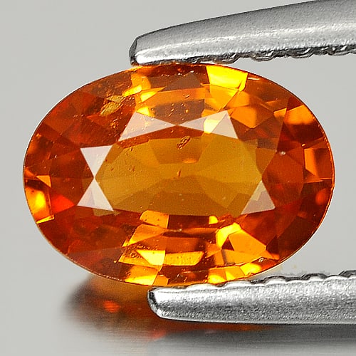 Natural Orange Spessartine Garnet 0.80 Ct. Oval Shape 6.9 x 5 Mm Gemstone From Nigeria: Product ID: 802921454 Product Name: Natural Spessartine Weight: 0.80 CT. Size: 6.9 x 5 x 3 MM. Shape: Oval Color: Orange Clarity:SI Luster: Good Gems Origin: Nigeria Treatment: Unheated Crystal Struct