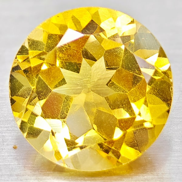 Natural Yellow Citrine 3.88 Ct. Round Shape 10 Mm Gemstone From Brazil: Product ID: 801815132 Product Name: Natural Citrine Weight: 3.88 CT. Size: 10 x 10 x 6.8 MM. Shape: Round Color: Yellow Clarity:VSI Luster: Good Gems Origin: Brazil Treatment: Unheated Crystal Structu