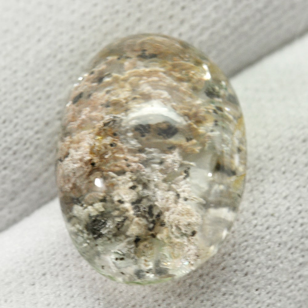 Natural Moss Quartz 12.49 Ct. Oval Cabochon Shape 18 x 12.4 Mm. Gemstone From Thailand: Product ID: 805529559 Product Name: Natural Quartz Weight: 12.49 CT. Size: 18 x 12.4 x 8.7 MM. Shape: Oval Cabochon Color: White Clarity:Semi - Transparent Luster: Good Gems Origin: Thailand Treatment