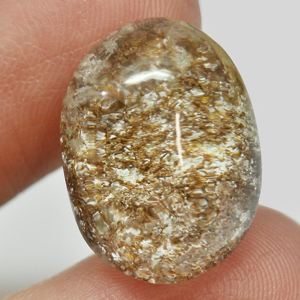 Natural Moss Quartz 16.82 Ct. Oval Cabochon Shape 19.3 x 14.3 Mm. Gemstone From Thailand: Product ID: 805529359 Product Name: Natural Quartz Weight: 16.82 CT. Size: 19.3 x 14.3 x 8.8 MM. Shape: Oval Cabochon Color: White Clarity:Semi - Transparent Luster: Good Gems Origin: Thailand Treatme