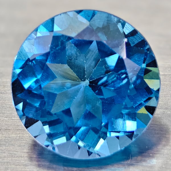 Natural Swiss Blue Topaz 3.70 Ct. VVS Round Shape 9 Mm. Gemstone From Brazil: Product ID: 807167739 Product Name: Natural Blue Topaz Weight: 3.70 CT. Size: 9 x 9 x 6.2 MM. Shape: Round Color: Swiss Blue Clarity:VVS Luster: Good Gems Origin: Barzil Treatment: Treated Crystal Str