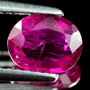 Natural Purplish Pink Ruby 0.94 Ct. Oval Shape 7 x 5.5 Mm Gemstone From Tanzania (1 of 3)