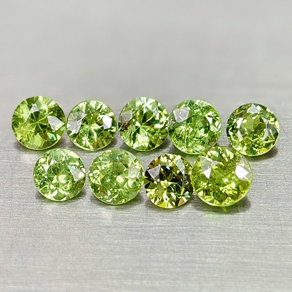 Natural Green Demantoid Garnet 1.27 Ct. 9 Pcs. Round Diamond Cut 3.1 Mm Gemstones From Madagascar: Product ID: 802936439 Product Name: Natural Demantoid Weight: 1.27 CT. Size: 3.1 x 3.1 x 2.3 MM. Shape: Round Diamond Cut Color: Green Clarity:VVS Luster: Good Gems Origin: Madagascar Treatment: Unhea