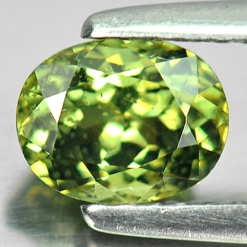 Certified Natural Demantoid Garnet 1.18 Ct Oval Shape 6.45 x 5.08 Mm. Gemstone Unheated From: Product ID: 802915602 Product Name: Natural Demantoid Weight: 1.18 CT. Size: 6.45 x 5.08 x 4.14 MM. Shape: Oval Color: Green Clarity:SI1 Luster: Very Good Gems Origin: Madagascar Treatment: Unheated C