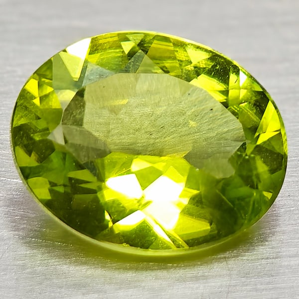 Natural Green Peridot 2.30 Ct. Oval Shape 10 x 8 Mm Gemstone From Pakistan: Product ID: 805317272 Product Name: Natural Peridot Weight: 2.30 CT. Size: 10 x 8 x 4.3 MM. Shape: Oval Shape Color: Green Clarity:VSI Luster: Very Good Gems Origin: Pakistan Treatment: Unheated Cryst