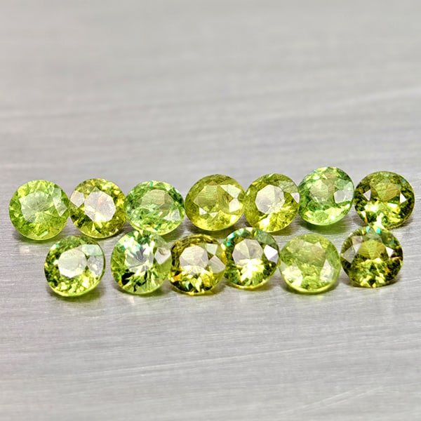 Natural Yellowish Green Demantoid Garnet 1.44 Ct. 13 Pcs Round Diamond Cut 3 Mm Gemstones: Product ID: 802936582 Product Name: Natural Demantoid Weight: 1.44 CT. Size: 3 x 3 x 1.7 MM. Shape: Round Diamond Cut Color: Yellowish Green Clarity:VSI Luster: Good Gems Origin: Madagascar Treatment: