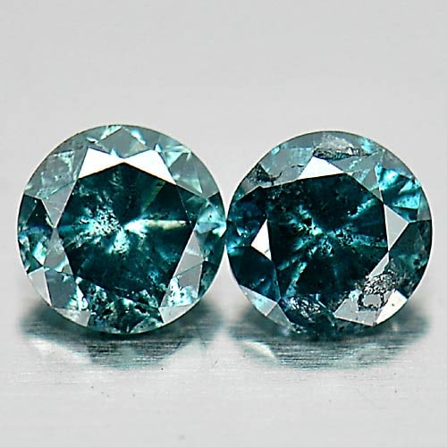 Natural Blue Loose Diamond 0.16 Ct. 2 Pcs. Round Brilliant Cut 2.7 Mm From Belgium: Product ID: 802103215 Product Name: Natural Enhanced Diamond Weight: 0.16 CT. Size: 2.7 x 2.7 x 1.7 MM. Shape: Round Brilliant Cut Color: Blue Clarity:SI1 Luster: Scintillating Gems Origin: Belgium Tr