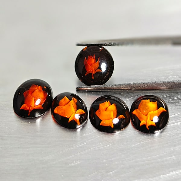 Natural Amber 2.93 Ct. 5 Pcs. Flower Carving In Oval Cabochon Shape 9.2 x 7.7 Mm Gemstones From: Product ID: 819091013 Product Name: Natural Amber Weight: 2.93 CT. Size: 9.2 x 7.7 x 2.9 MM. Shape: Oval Cabochon Color: Brown Yellow Clarity:Semi - Transparent Luster: Good Gems Origin: Poland Treatm