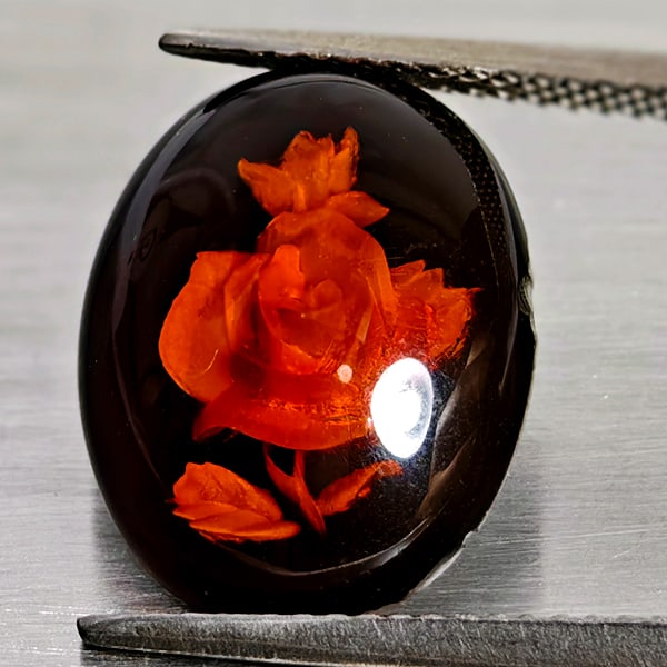 Natural Amber 2.30 Ct. Flower Carving In Oval Cabochon 15.5 x 12.4 Mm Gemstone From Poland: Product ID: 819091067 Product Name: Natural Amber Weight: 2.30 CT. Size: 15.5 x 12.4 x 4.5 MM. Shape: Oval Cabochon Color: Brown Yellow Clarity:Semi - Transparent Luster: Good Gems Origin: Poland Trea