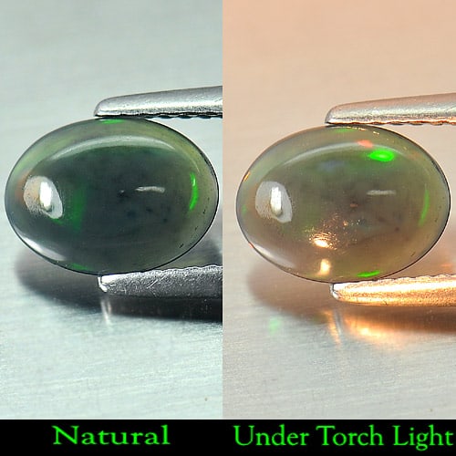 Natural Fire Red Black Opal 0.78 Ct. Oval Cabochon Shape 9.3 x 6.9 Mm. Gemstone: Product ID: 818724447 Product Name: Natural Opal Weight: 0.78 CT. Size: 9.3 x 6.9 x 2.6 MM. Shape: Oval Cabochon Color: Rainbow Fire Red Black Clarity:Semi - Transparent Luster: Iridescent Gems Origin