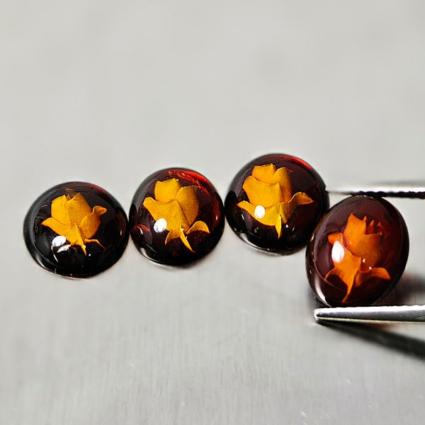 Natural Amber Carving With Flowers Three Dimensional 3.05 Ct. 4 Pcs. Gemstone From Poland: Product ID: 819091024 Product Name: Natural Amber Weight: 3.05 CT. Size: 9.9 x 8.7 x 3.4 MM. Shape: Oval Cabochon Color: Brown Yellow Clarity:None Luster: Good Gems Origin: Poland Treatment: Unheated 